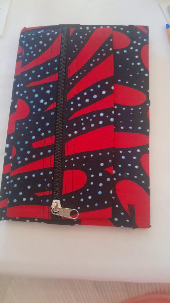 A notebook and pouch made from recycled kitenge fabric to promote environmental conservation